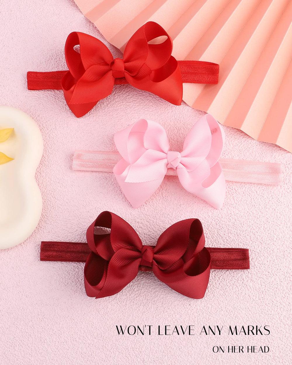 Jollybows hairband on baby girl demonstrates comfortable, secure wear.