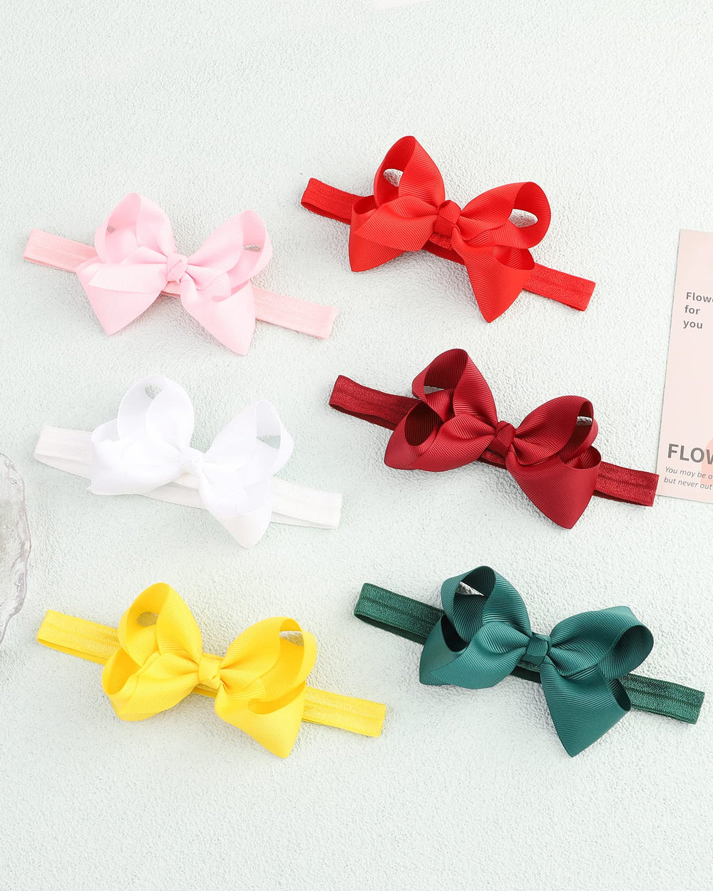 Jollybows hairband soft-band detail emphasizes gentle fit.