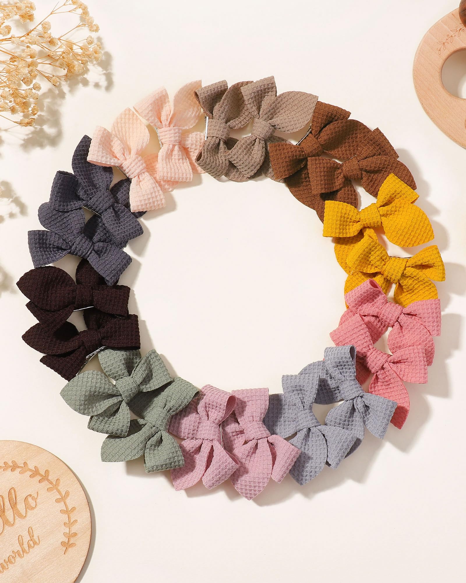 Jollybows handmade baby bows suited for showers, birthdays, and photoshoots.