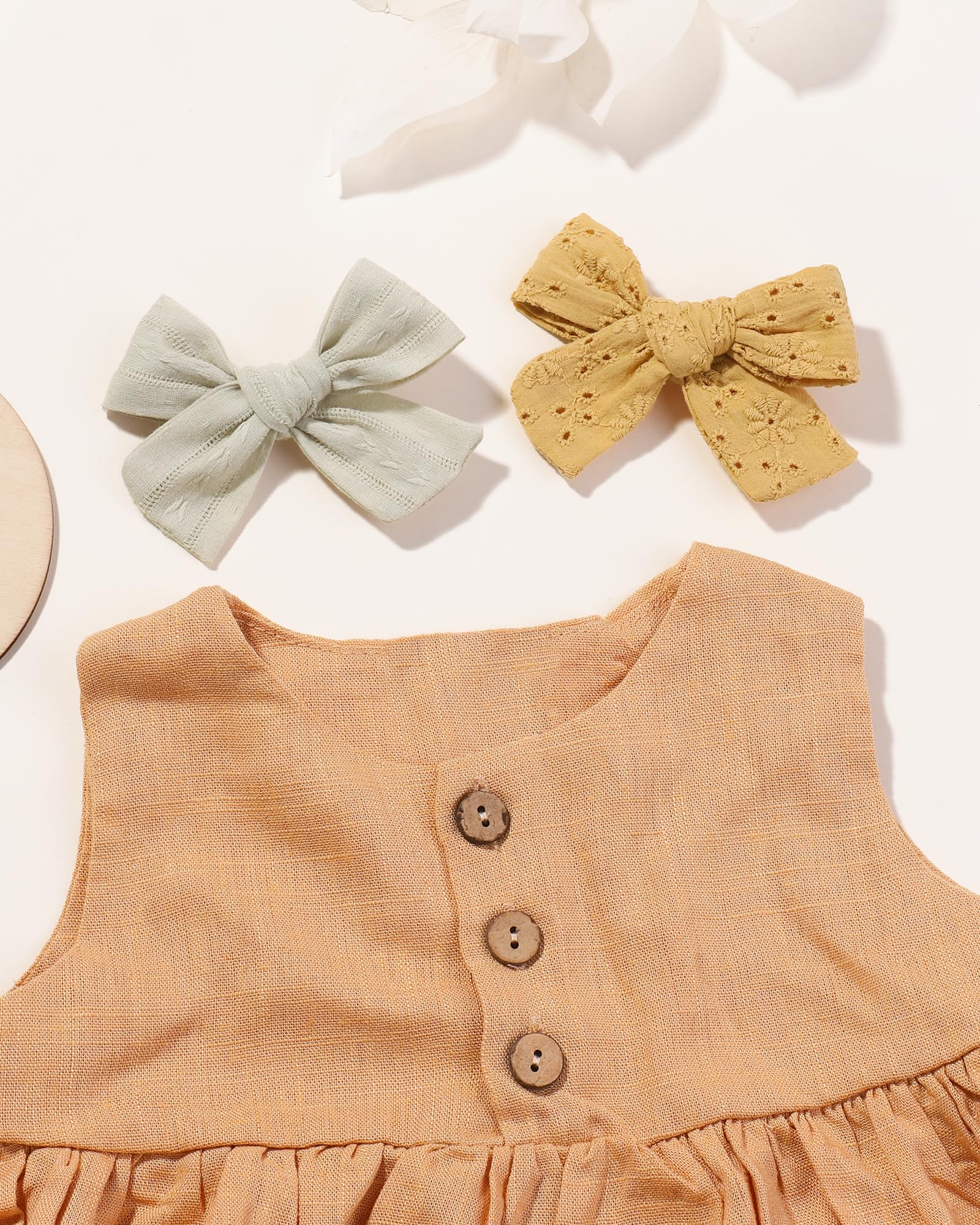 Jollybows linen bow closeup highlights soft texture for comfortable daily wear.