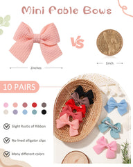 Jollybows mini bow 2in ivory with gentle clip for tidy hair.