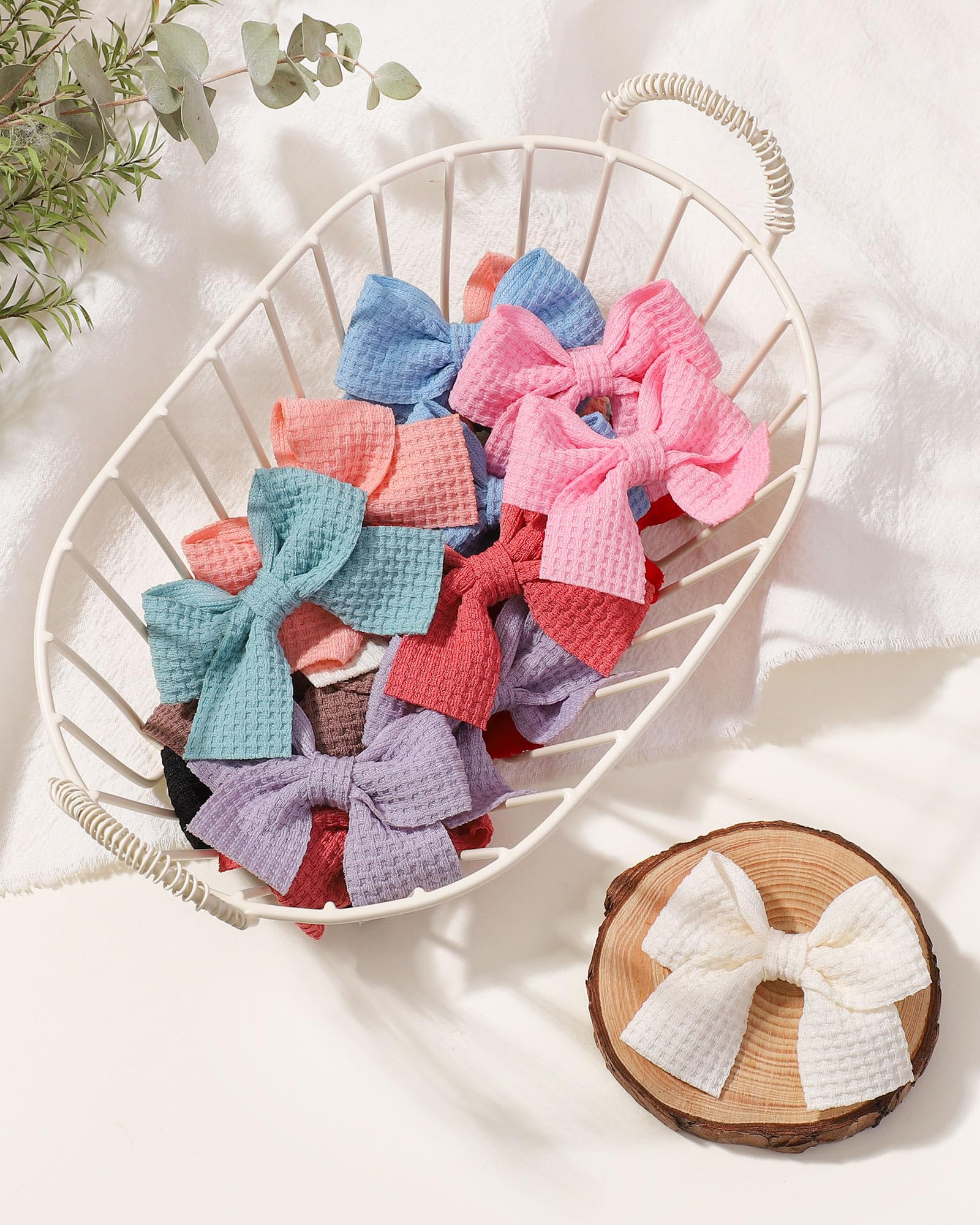 Jollybows mini bow 2in mauve adds gentle color for photos.