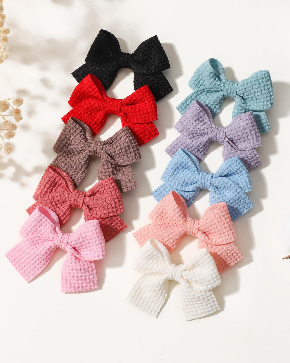 Jollybows mini bow 2in pastel pink ideal for birthdays and photos.