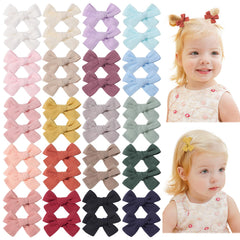 Jollybows mini lined hair clip close-up showing soft linen bow and gentle hold.