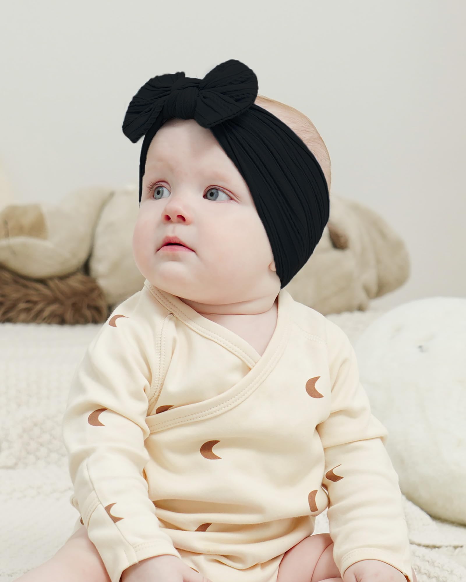 Jollybows newborn headband worn on a baby girl for easy, stylish access.