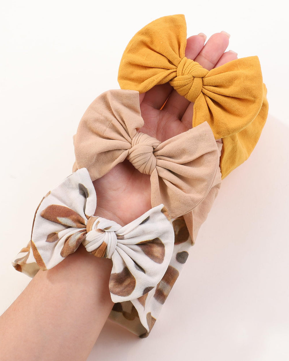 Jollybows newborn headbands stretch to grow with baby’s changing head size