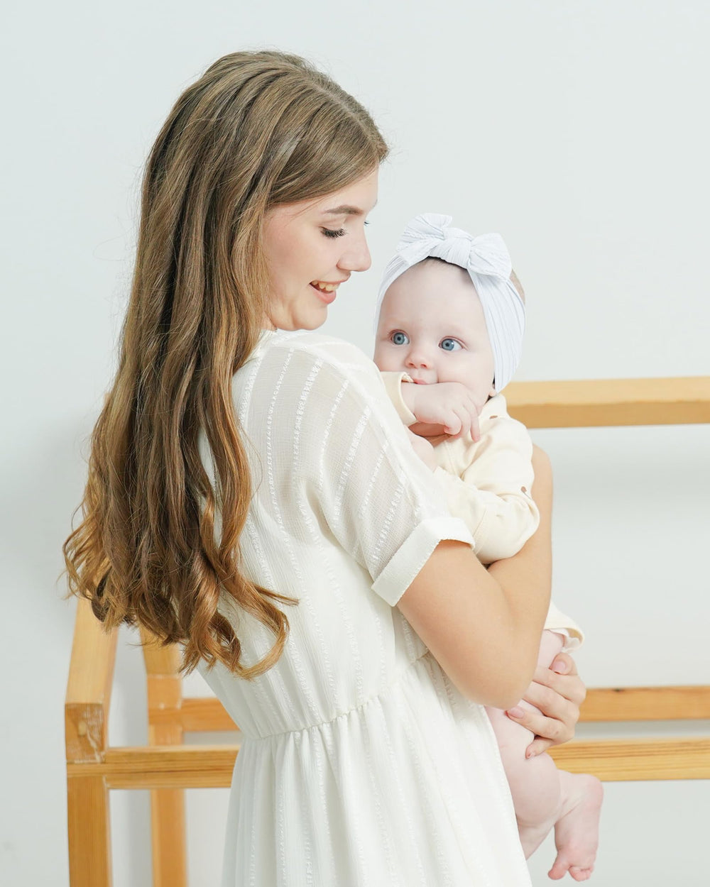 Jollybows newborn nylon headband stretches for comfortable all-day wear.