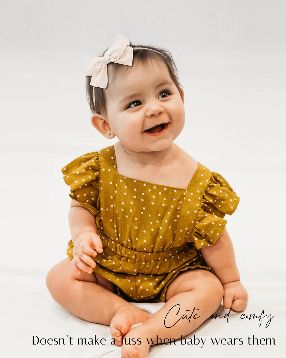 Jollybows newborn-to-toddler-friendly fit demonstrated on an infant.