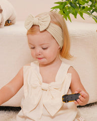 Jollybows nylon headwrap soft-skin highlights gentle stretch for daily wear.