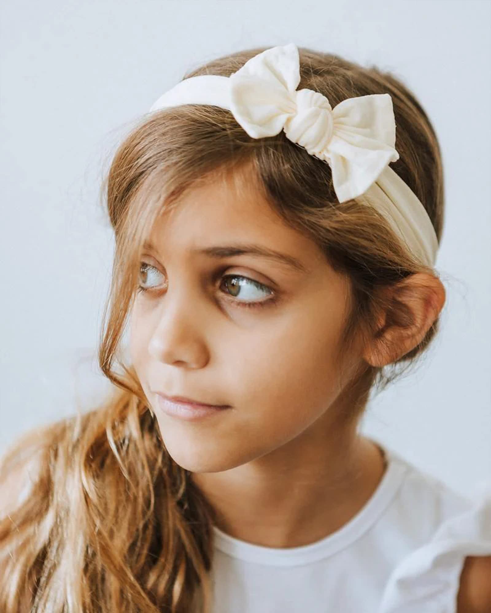 jollybows pack of 3 headbands shown on baby model