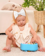 Jollybows pink baby-bow headband highlights sweet style while remaining breathable.