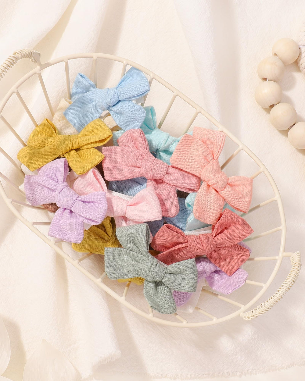Jollybows soft fabric hair bow close-up emphasizing gentle, comfortable wear.