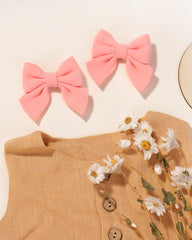 Jollybows soft-fabric woolen bows in closeup convey lightweight, durable wear.
