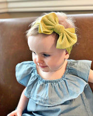 jollybows soft nylon headband close-up highlights gentle, stretchy fit