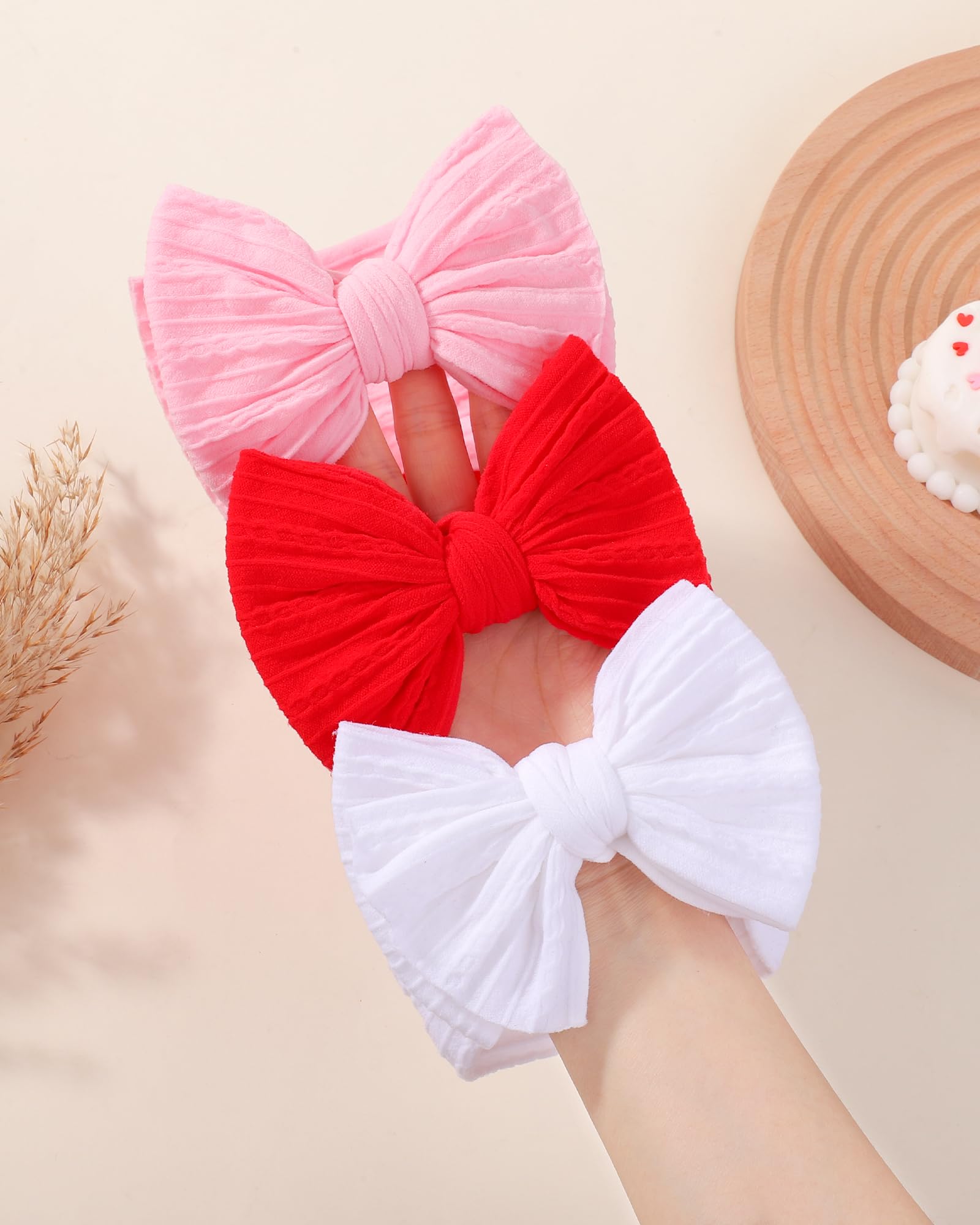 Jollybows stretchy-fit headband demonstrates comfortable sizing and easy adjustment.