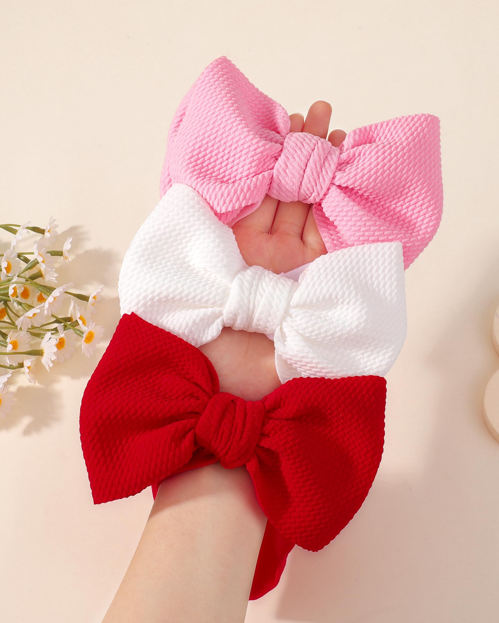 Jollybows stretchy headband-fit adapts from newborn to toddler sizes.