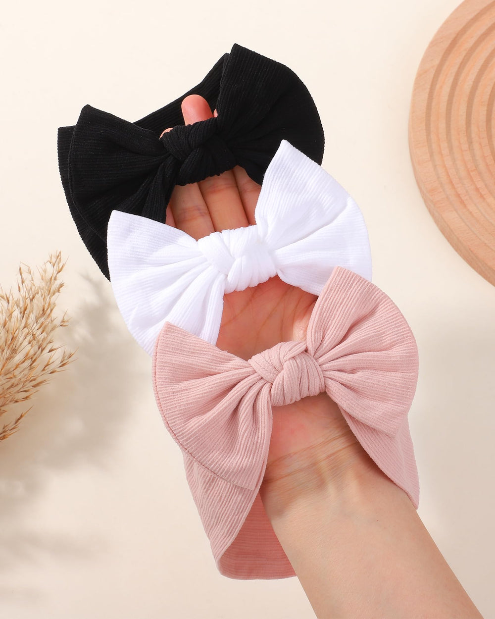 Jollybows headband on baby demonstrates stretch-to-fit comfort.