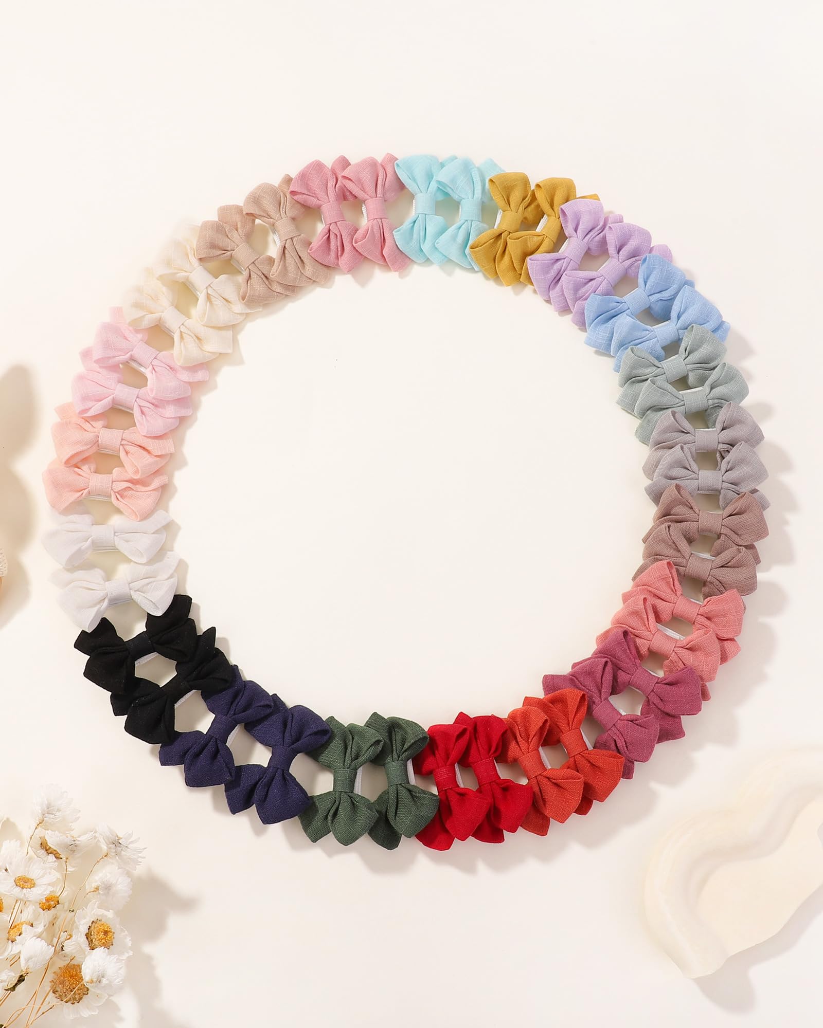 Jollybows tiny bows ideal for pigtails and mini hairstyles.