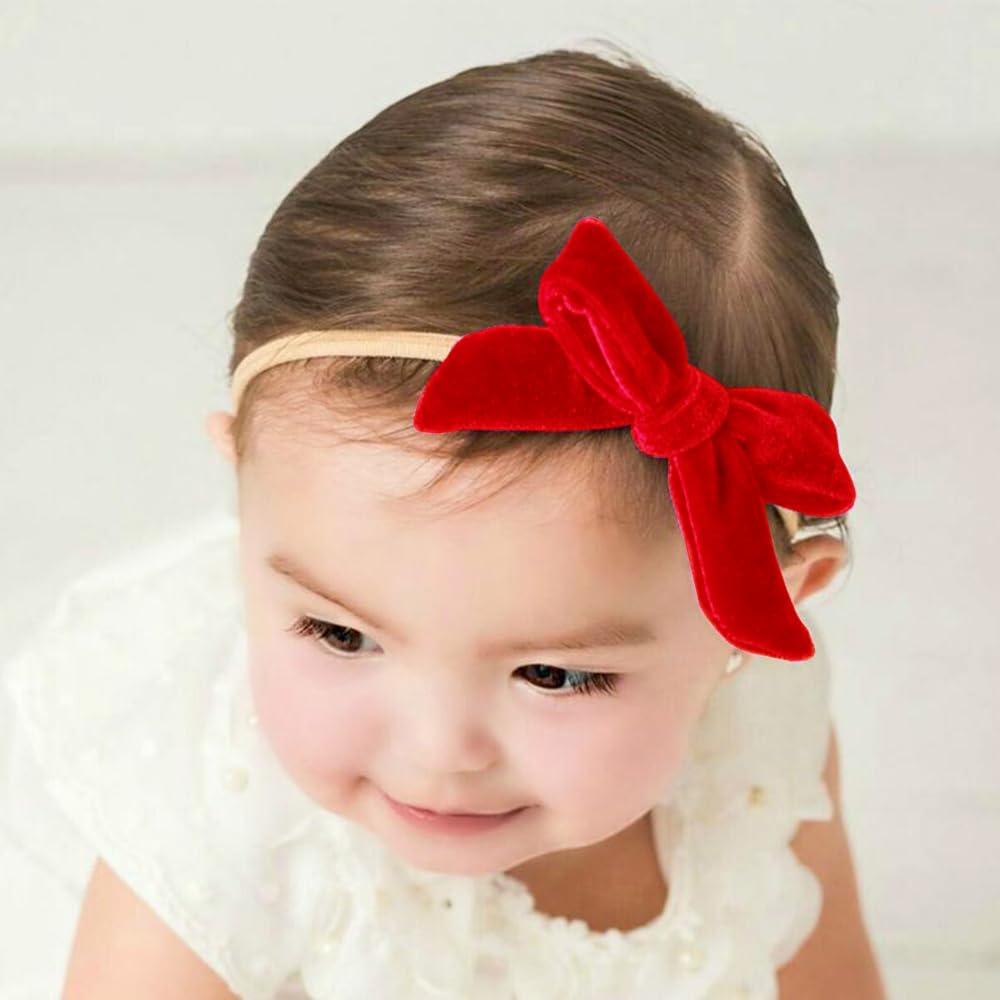 Jomila velvet bow closeup highlights lustrous texture and elegant detail.