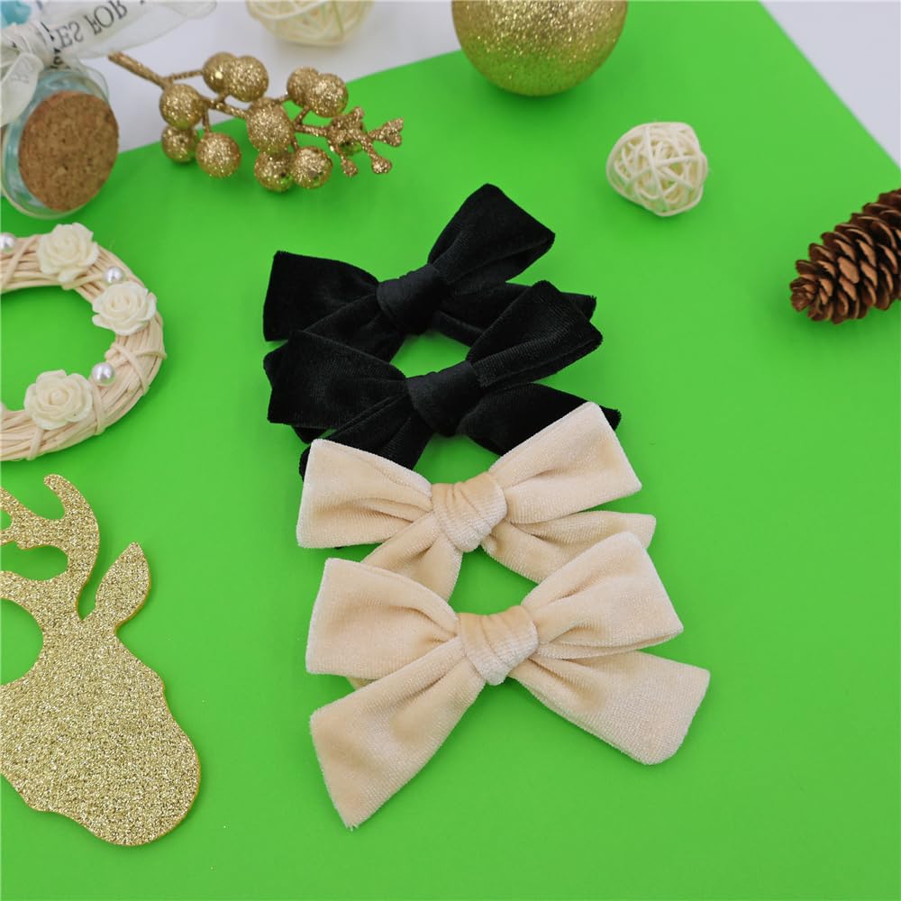 Jomila velvet bow hair clip styled with holiday outfit for festive look.