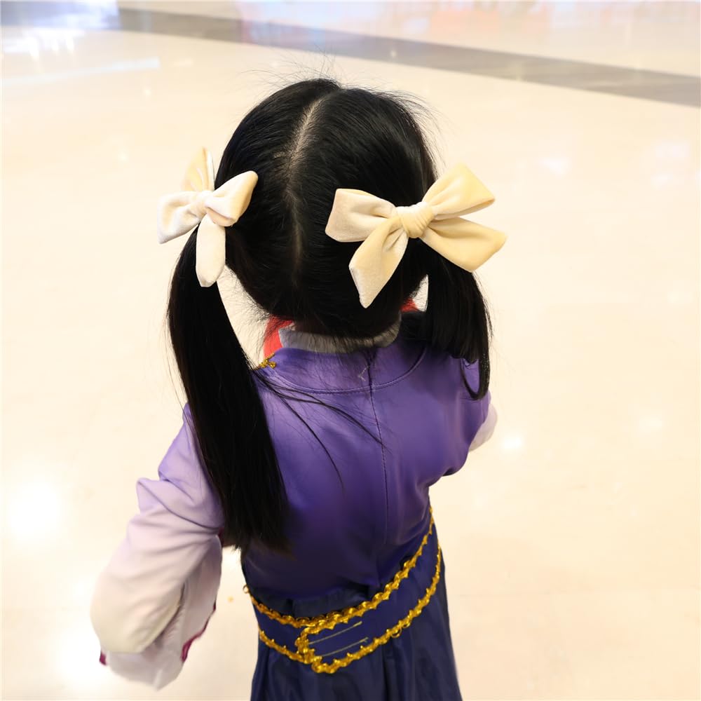 Jomila velvet bow hair clip side bangs grip demonstrates secure clip.