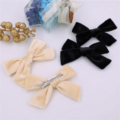 Jomila velvet bow hair clip size 3.5 inches suitable for all ages.
