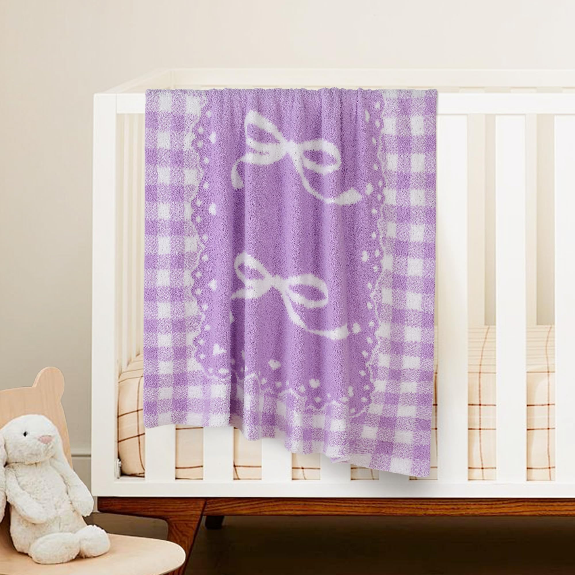 JOOJA baby blanket close-up shows durable knit that stays soft through washing.