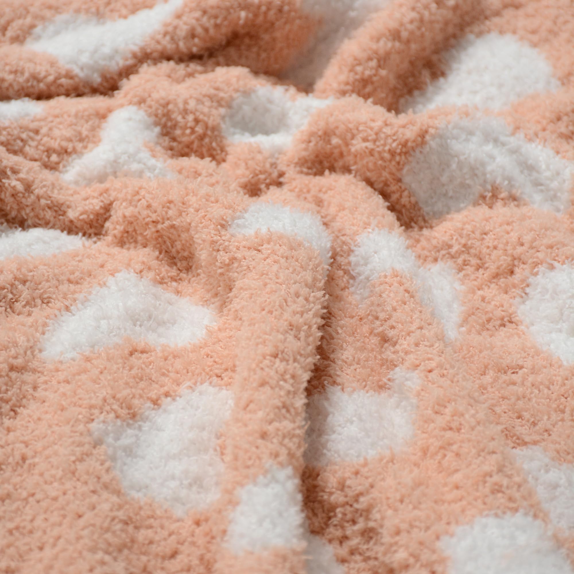 JOOJA coral pink gift-ready baby blanket with ribbon wrap for newborn gifting.
