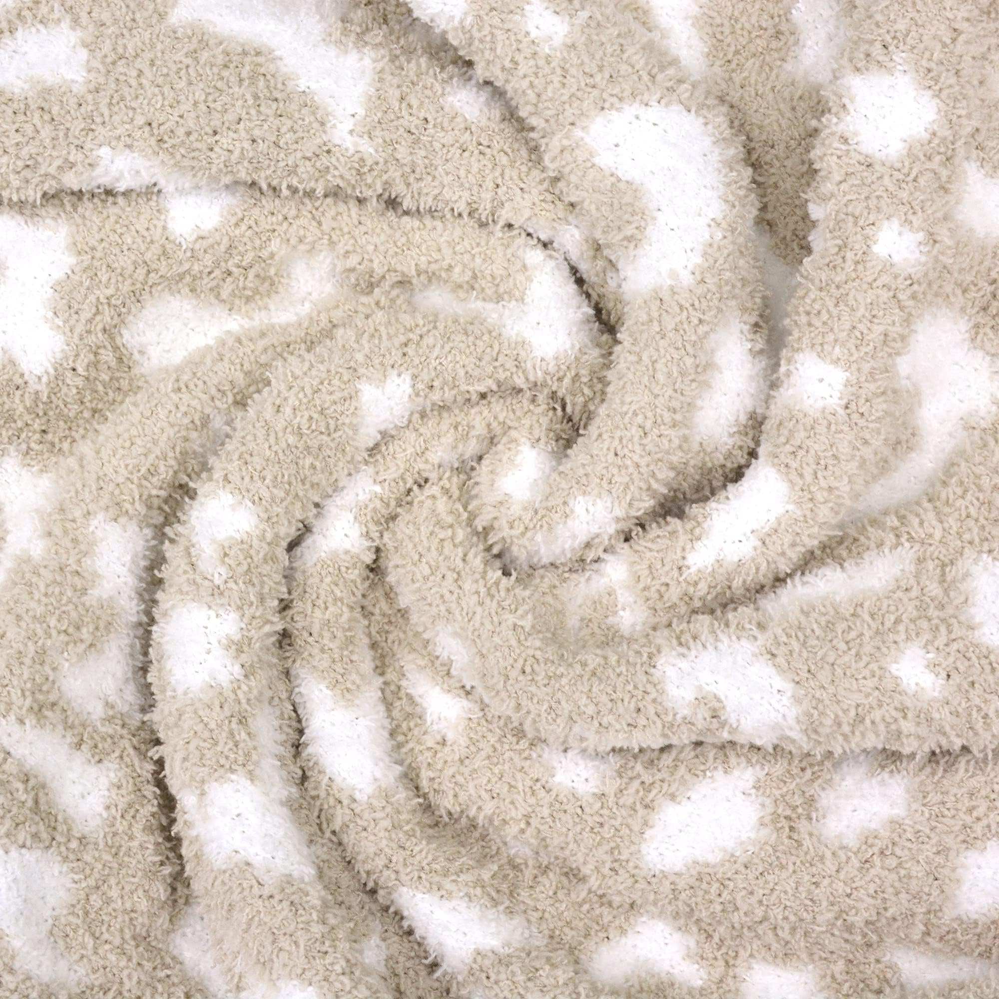 JOOJA hypoallergenic polyester blanket with ultra-soft texture designed for sensitive skin.
