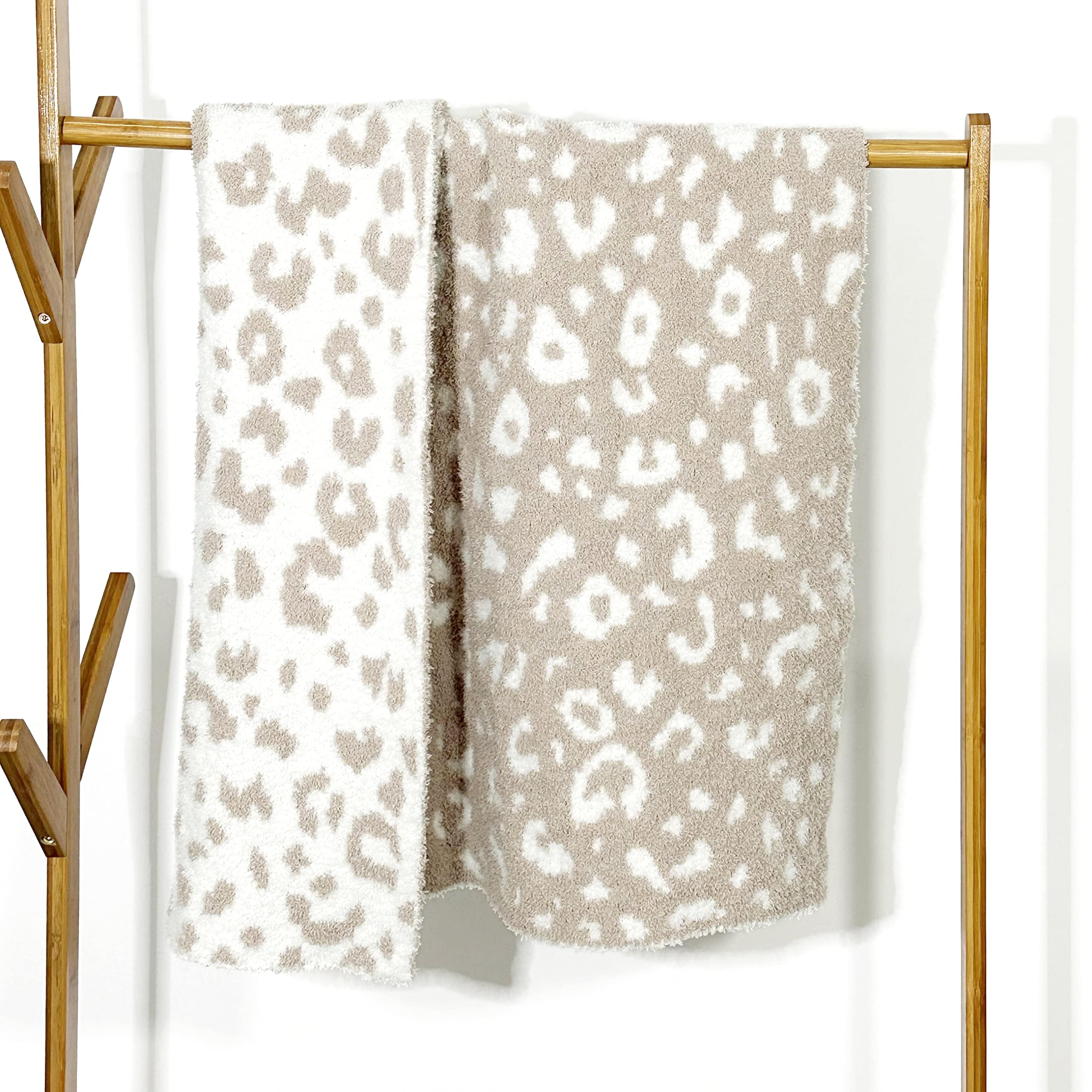 JOOJA soft baby cozy swaddling blanket in beige cheetah pattern offers gentle warmth for newborns.