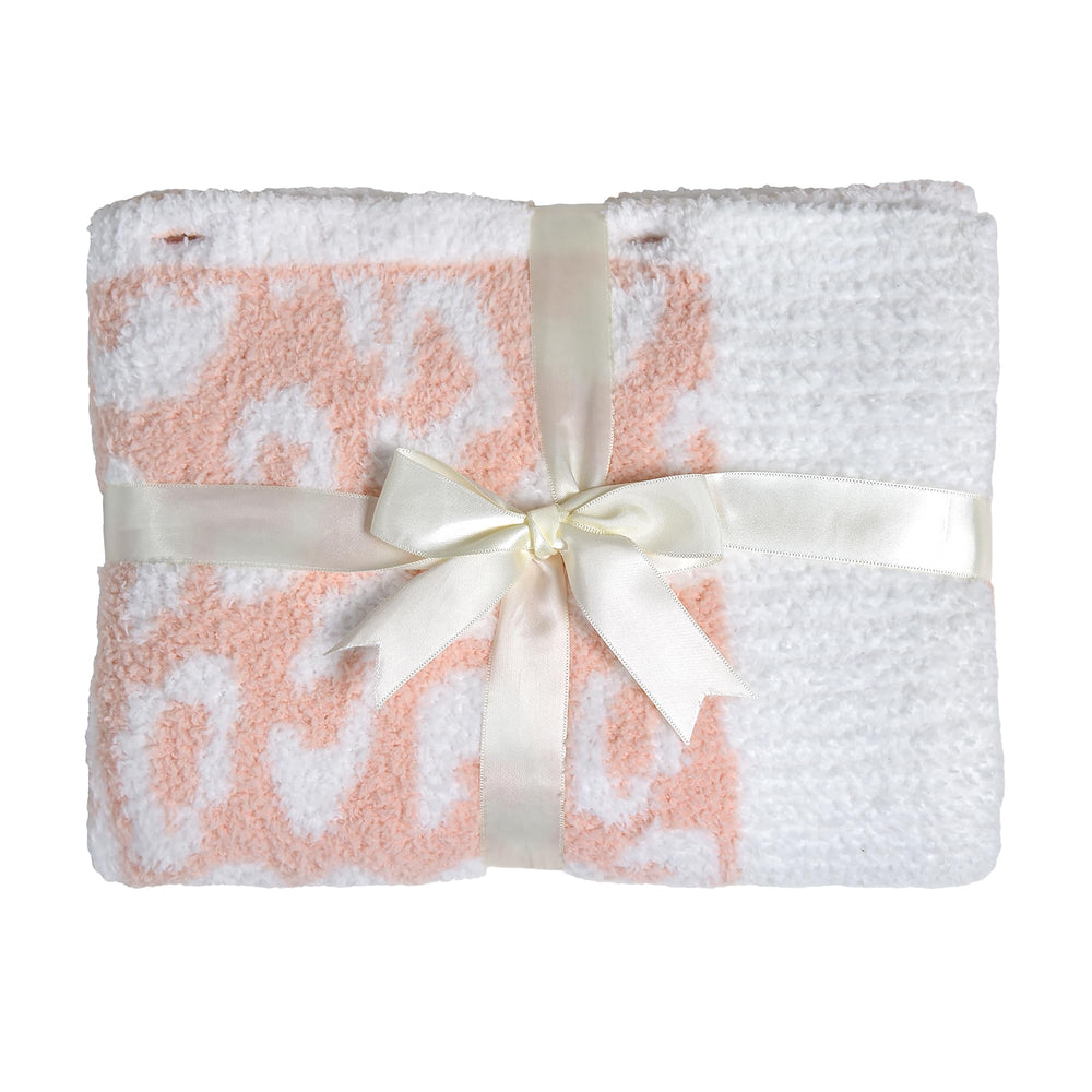 JOOJA swaddle doubles as travel or lap blanket when on the go.