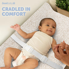 Jool Baby changing pad covers in oatmilk-wave show slip-resistant base for stable diaper changes.
