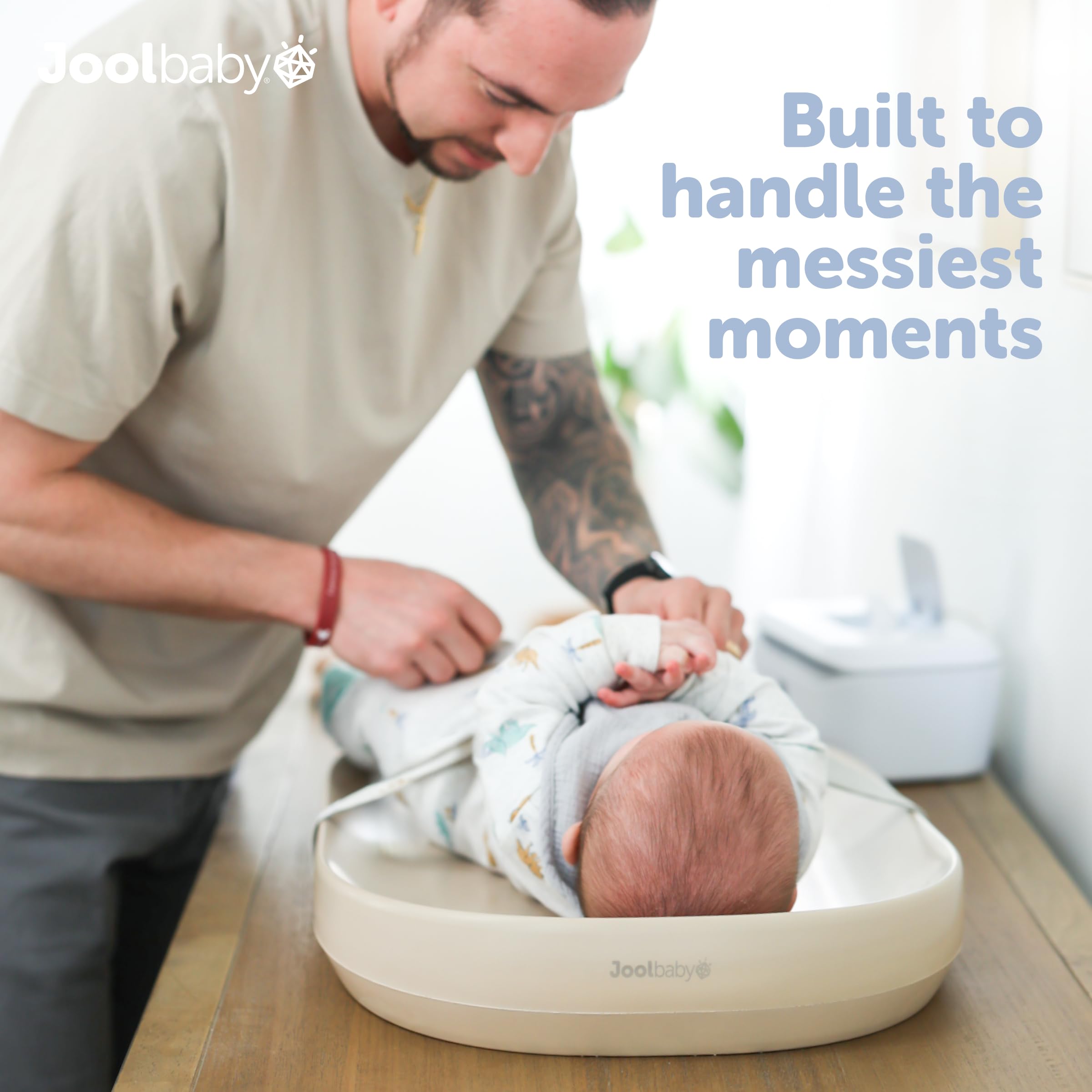 Jool Baby changing pad wipe-clean surface ready for messes with no cover changes