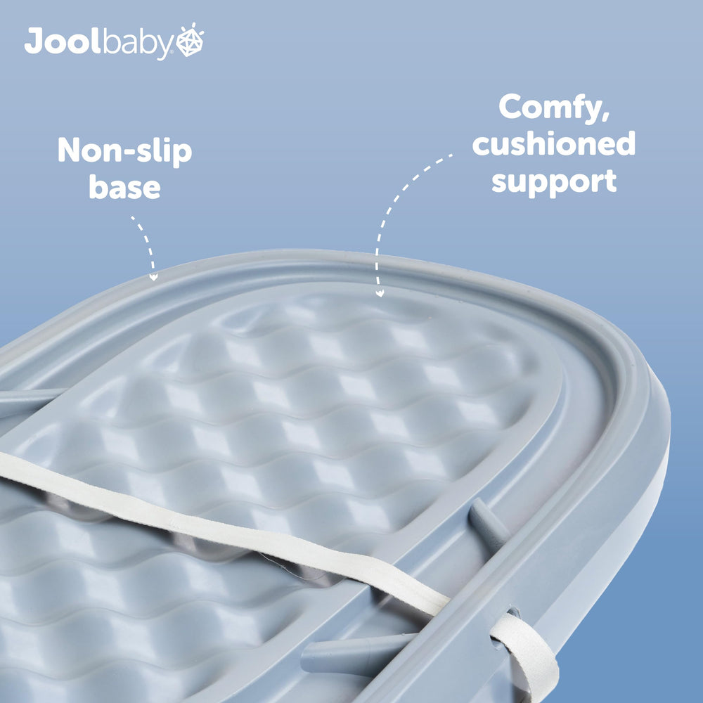 Jool Baby changing pad fits standard tables for versatile use.