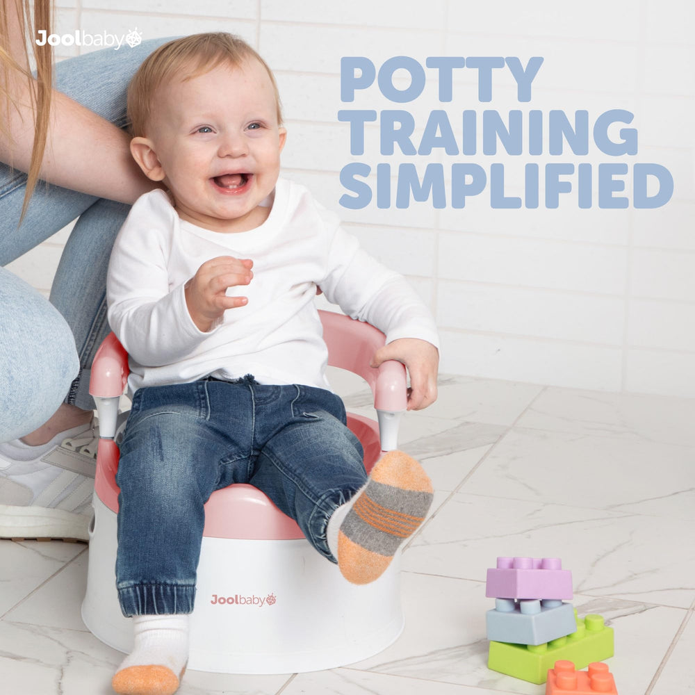 Jool Baby Potty Chair pink front view emphasizes splash guard for mess-free training.