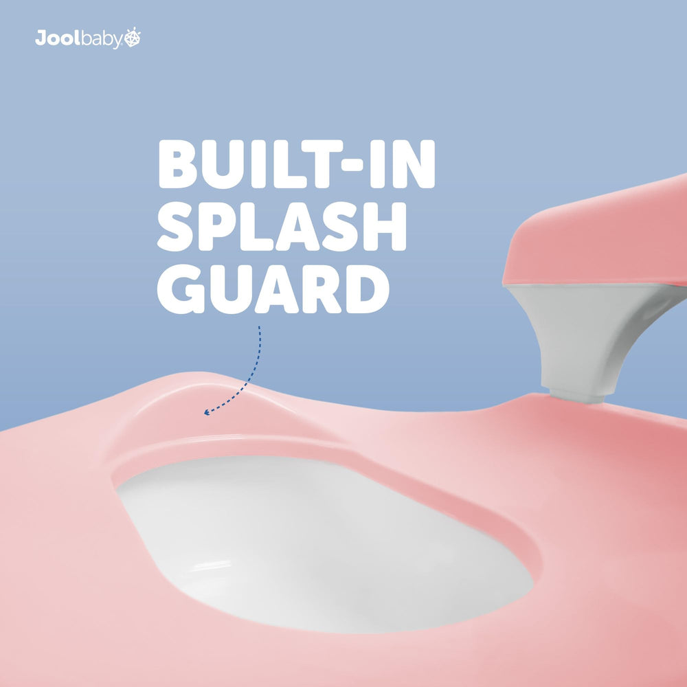 Jool Baby Potty Chair pink splash-guard helps prevent spills during training.