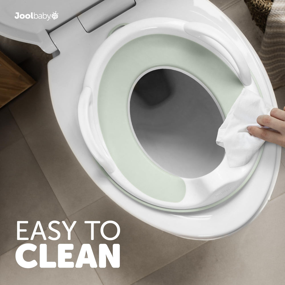 Jool Baby potty seat in sage color supports kid-sized bathroom routines.