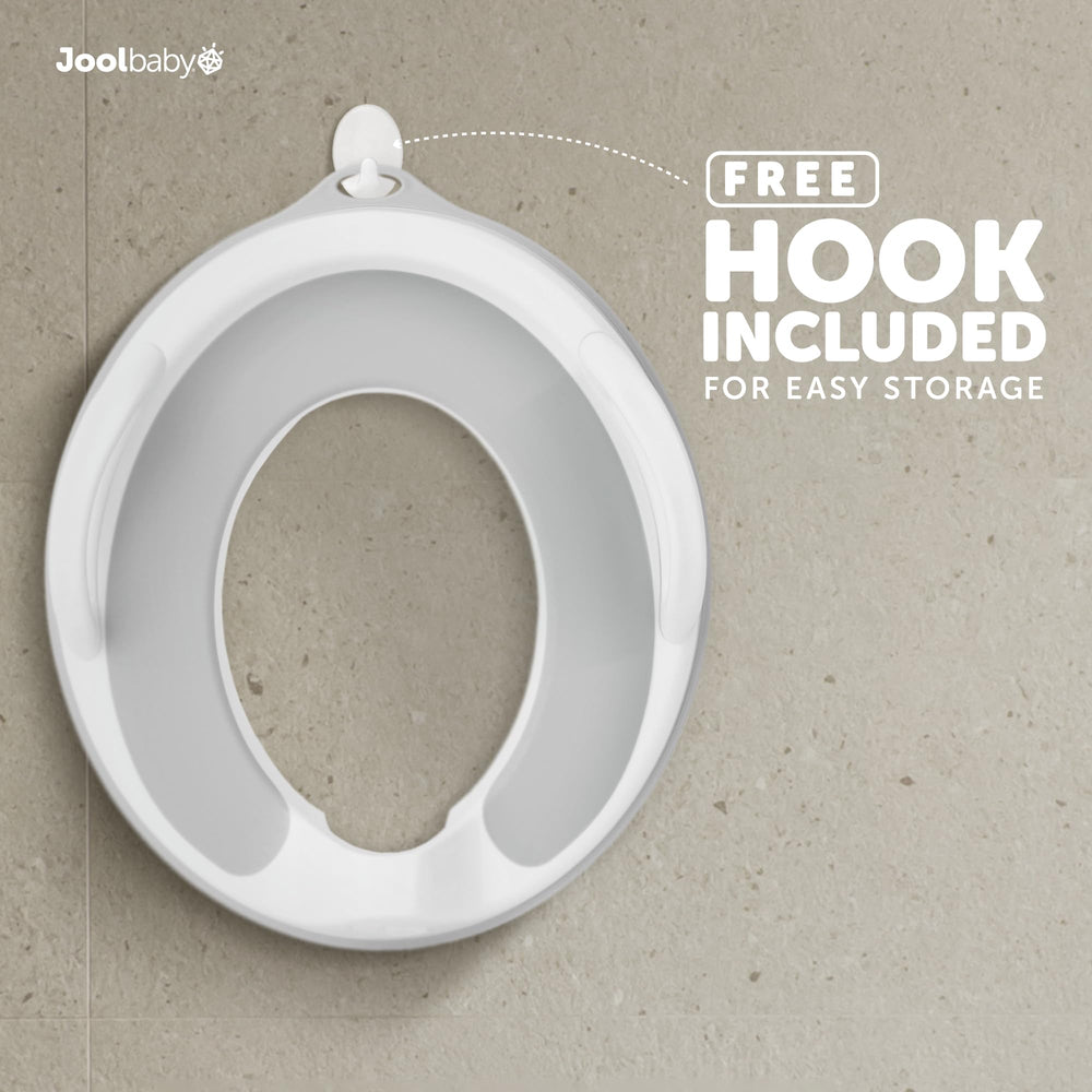 Jool Baby potty seat splash guard helps contain messes during use.