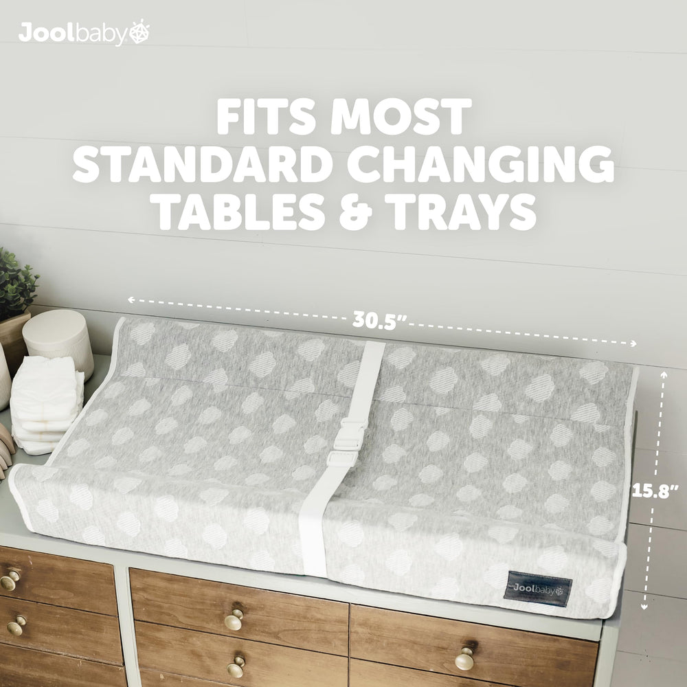 Jool Baby Serenity safety strap provides extra security during diaper changes.