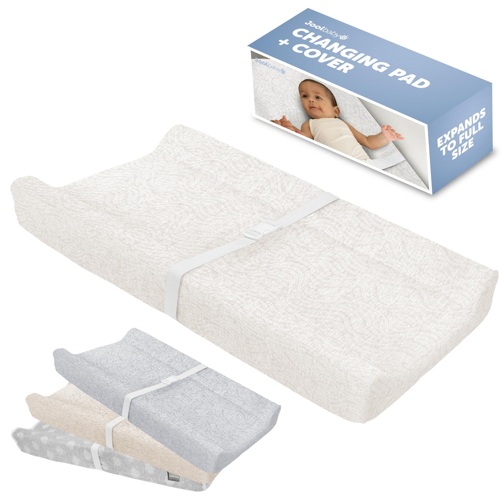 Jool Baby Serenity changing pad with wave pattern keeps baby comfortable.