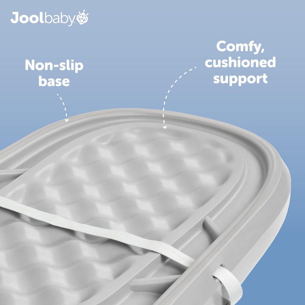 Jool Baby waterproof changing pad gray diaper-mess-downward design guides messes away from baby.