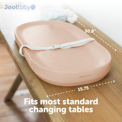 jool baby peach pad features raised sides and safety strap for added security