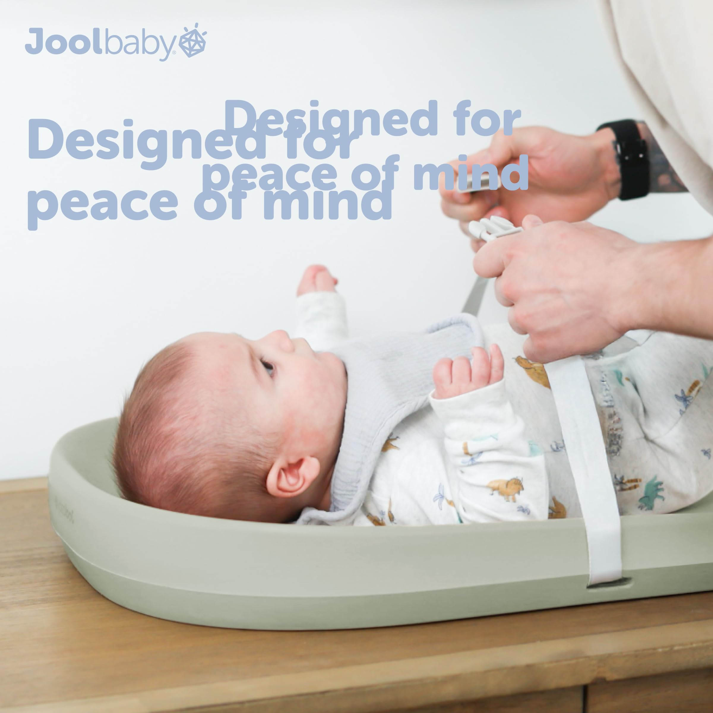 Jool Baby soft foam cushion supports comfortable diaper changes.