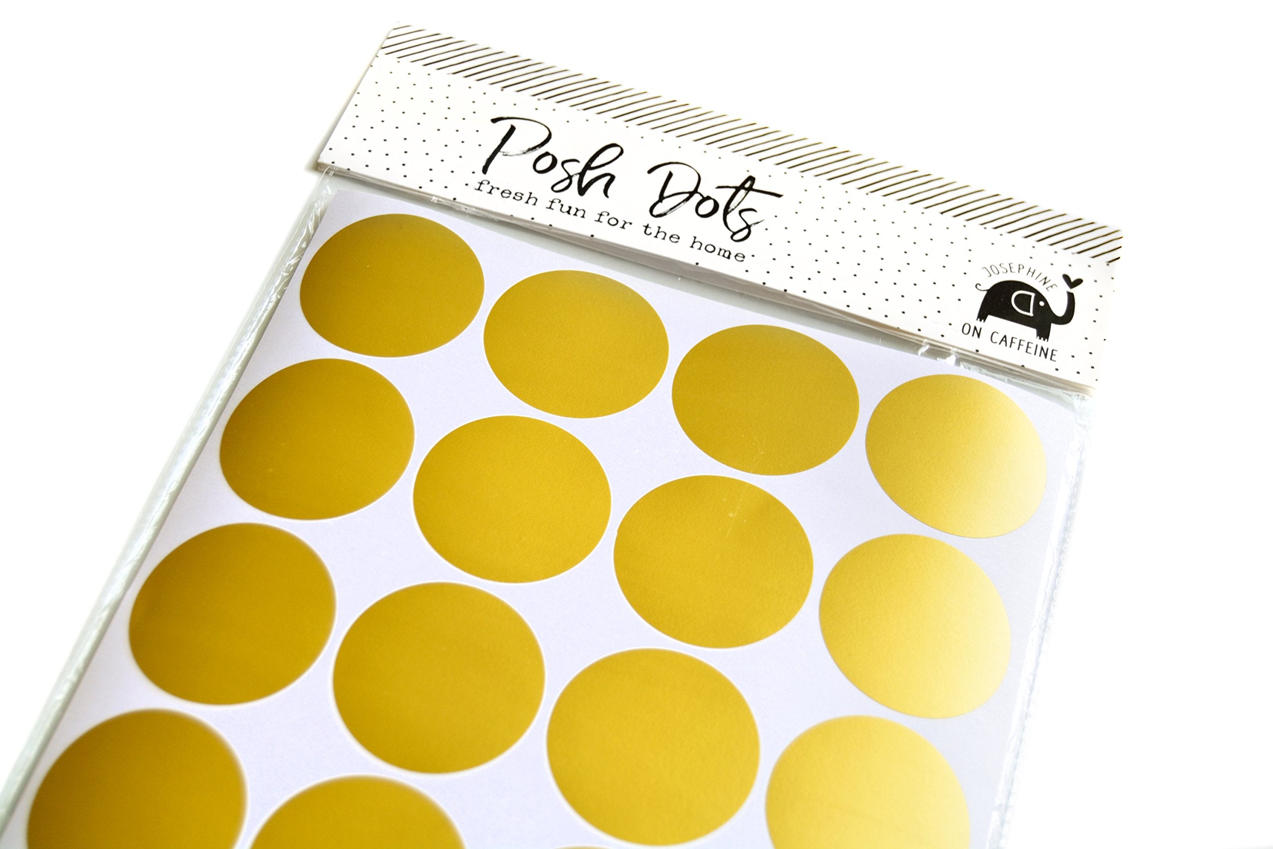 Nursery decor with removable gold circles for easy updates by Josephine on Caffeine.