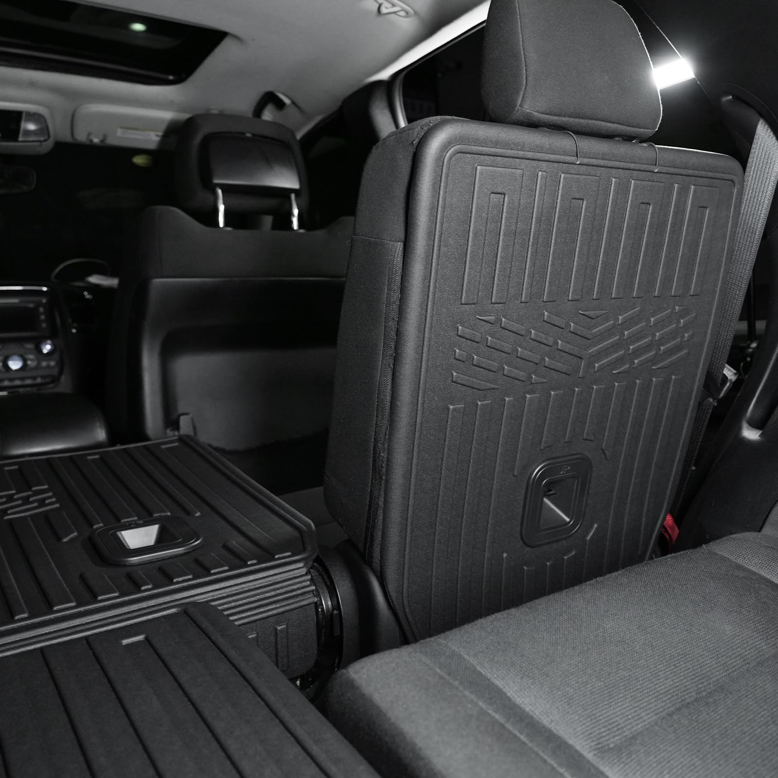 JOULARISE Durango kick mats seat-back installation demonstrates a secure fit.