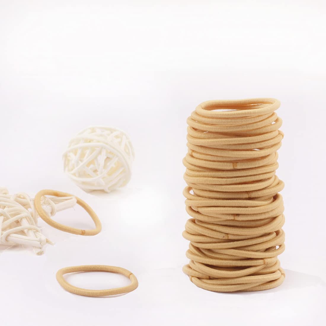 Joyeah 2mm x 2.5cm hair ties shown for tiny baby ponytails.