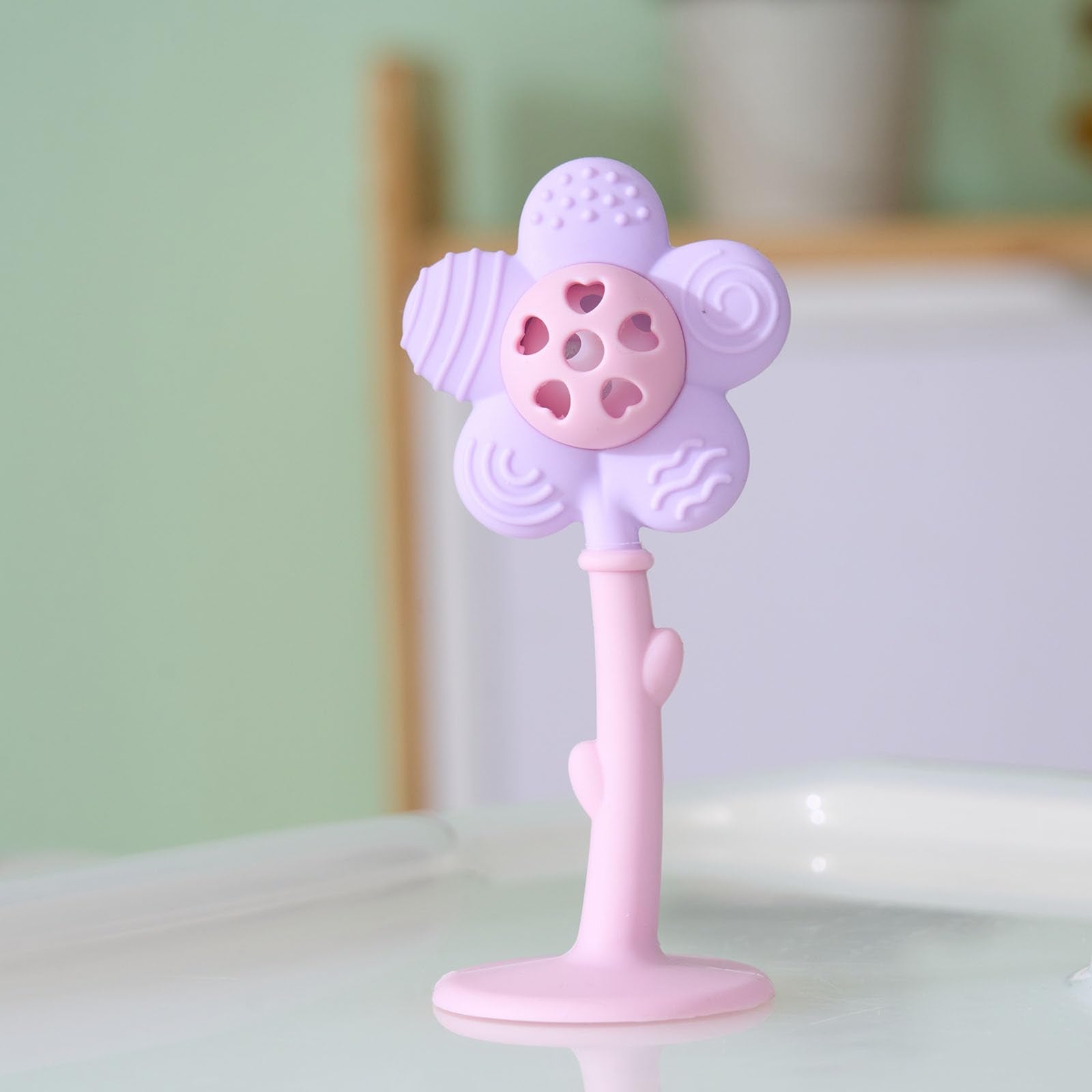 Joyfulia Sunnyflower teether with rattle sound supports sensory play and calm moments.