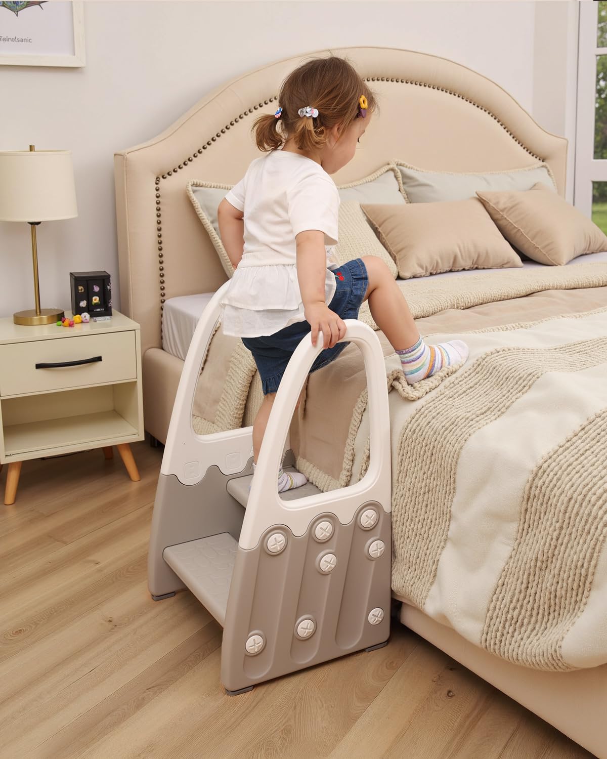 Joylico two-step stool with easy-to-grip handles aids independence.