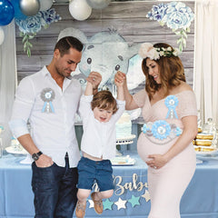 JOYMEMO dad-to-be corsage pin complementing couples' baby shower outfits