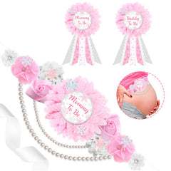 JOYMEMO pink winter snowflake maternity sash showcases elegant baby shower decor for mom-to-be